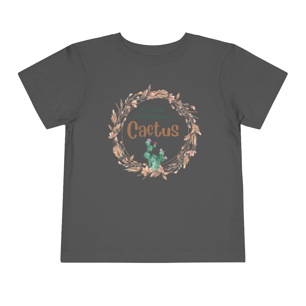 In a Field of Wildflowers, Be a Cactus Toddler Short Sleeve Tee